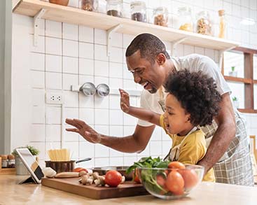 A happy family moving into their new home.